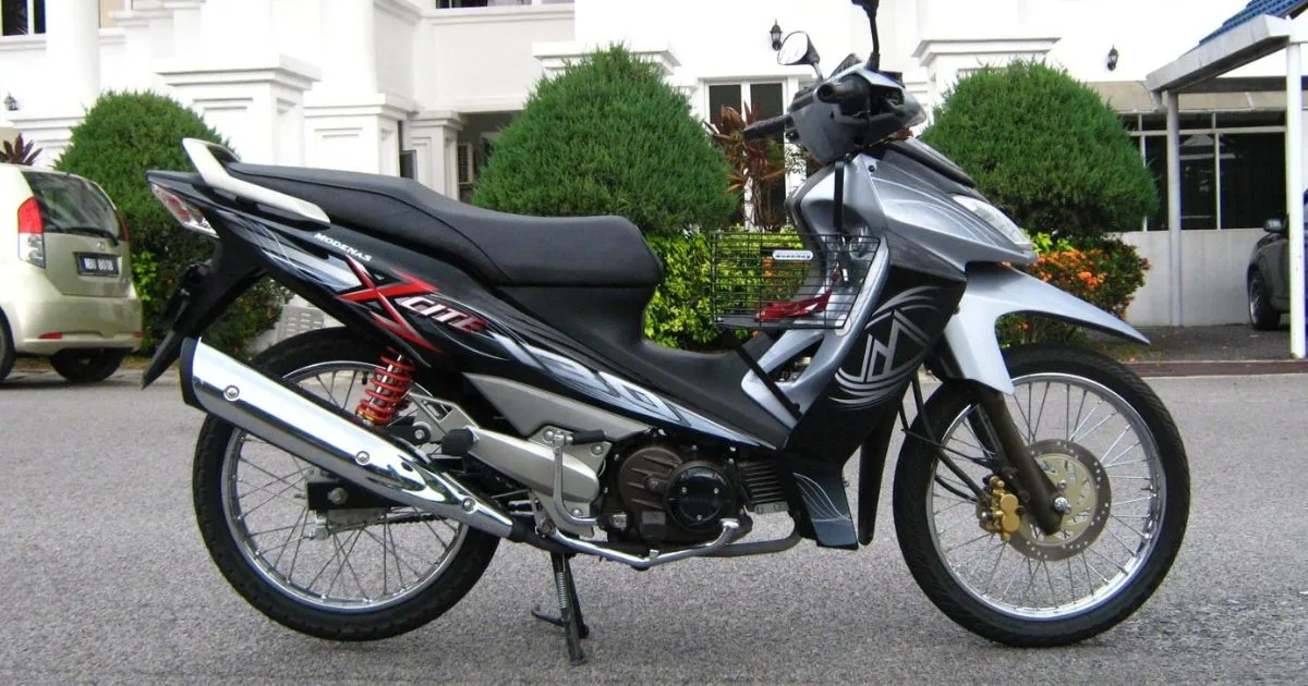 Modenas X-Cite, Kapcai Dengan Posisi Tangki Bahan Api Unik